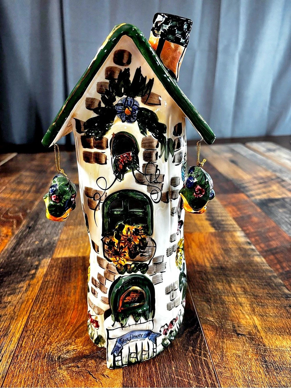 Blue Sky Clayworks Sunflower House ceramic tea light candle holder designed by a